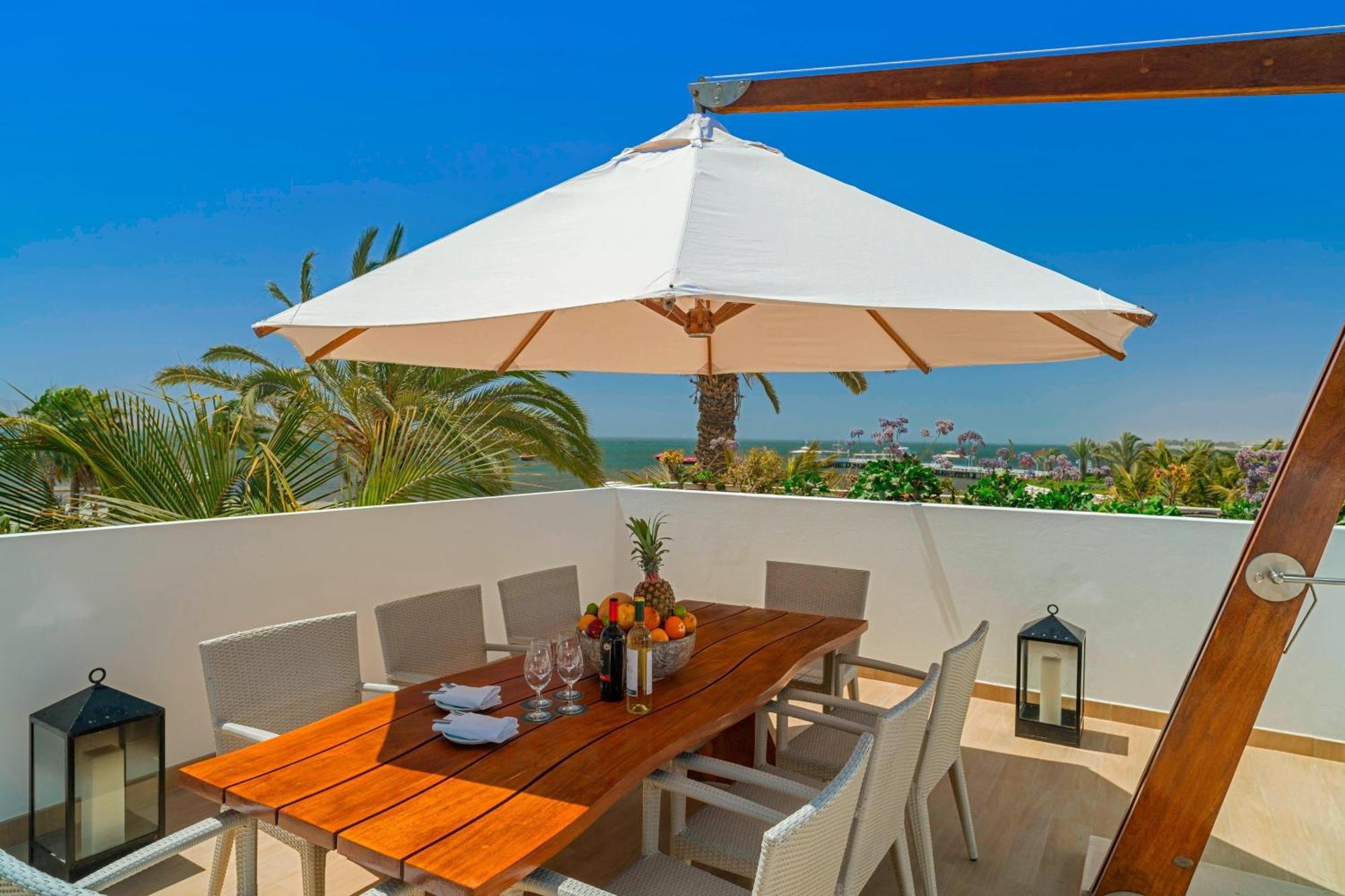 فندق باركاس، أحد منتجعات لاكشري كولكشن، باركاس باراكاس المظهر الخارجي الصورة A patio umbrella
